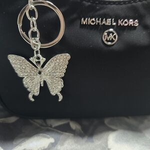 Super Cute Silver Butterfly Bag Char.